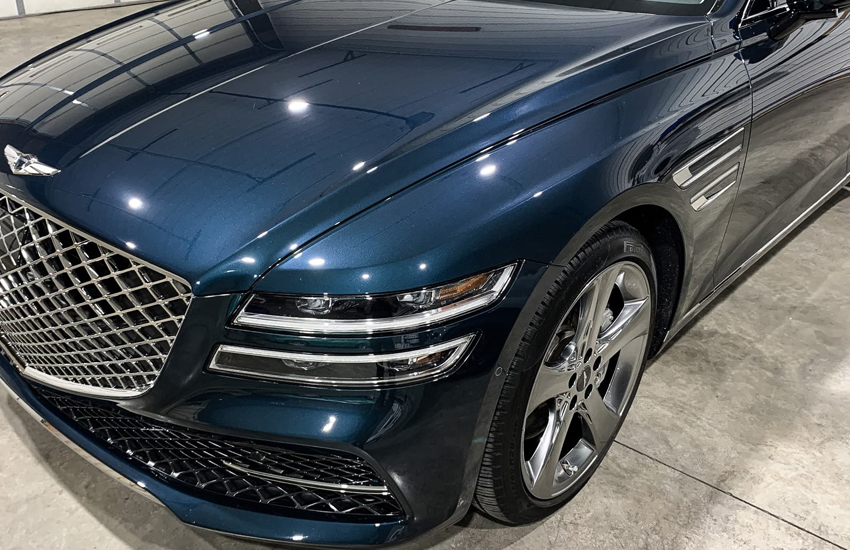 Blue Tesla Model S with ceramic coating at Zoz Express Rochester MN